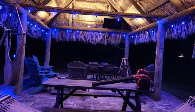 Cozy Waterfront Cottage w/ hot tub, dock & tiki