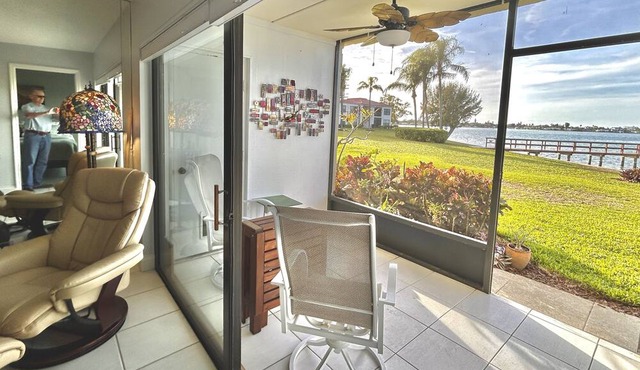 Waterfront condo with bay view, pool, patio, & W/D - calendar month rental