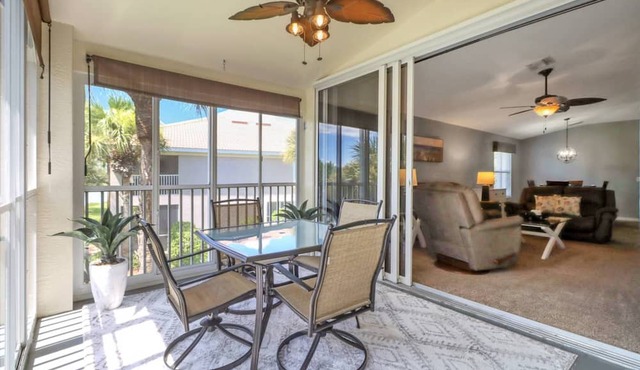 Resort-Style Living Awaits | Beautiful Colonial Country Club Condo with Water Views & Bikes Included