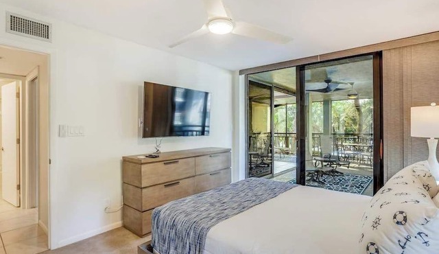 2nd-floor condo with private beach access, lanai, and access to heated pool