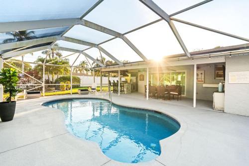 Heated PoolFire PitOutdoor KitchenCorn Hole